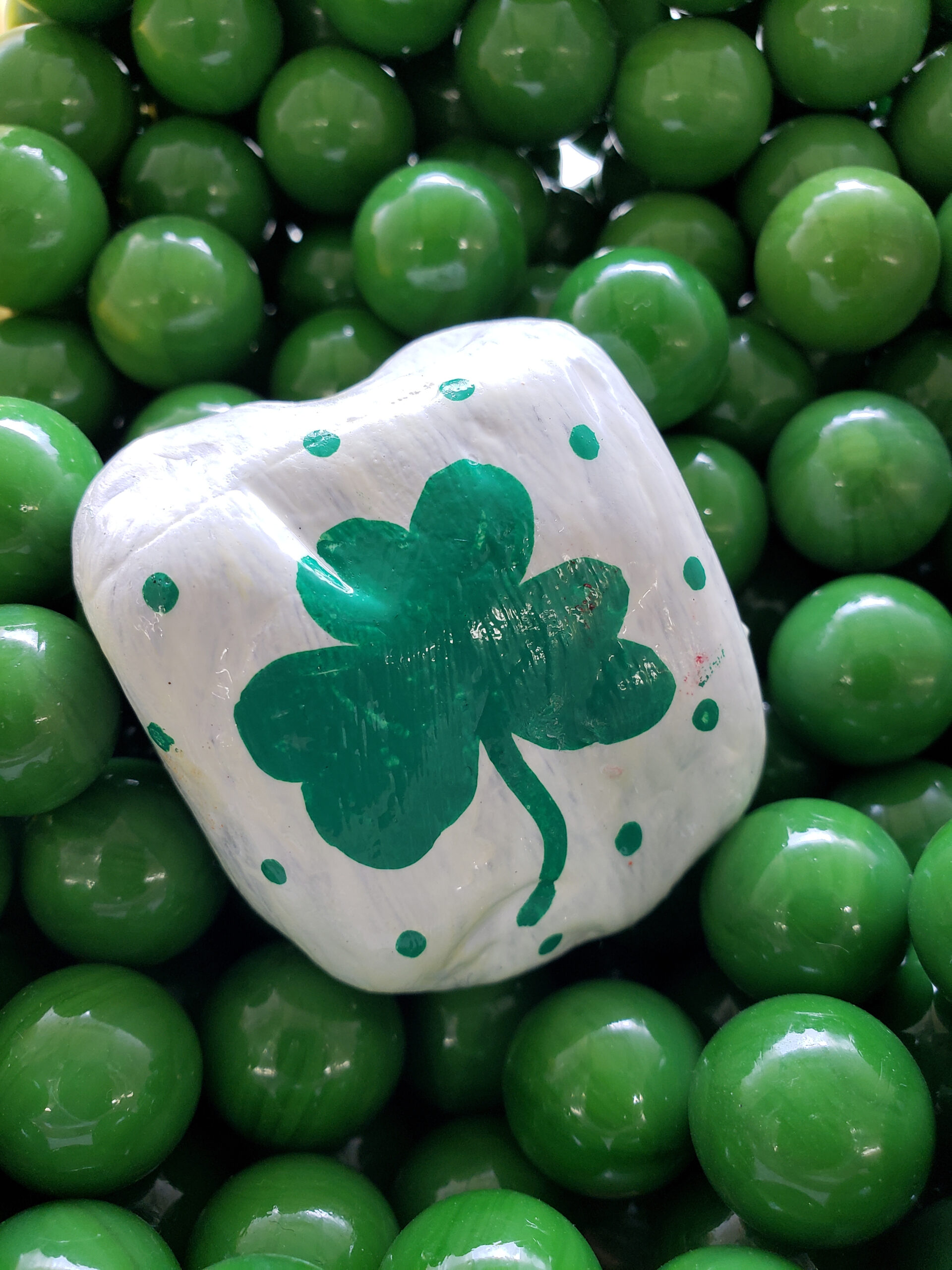 Shamrock painted on a rock