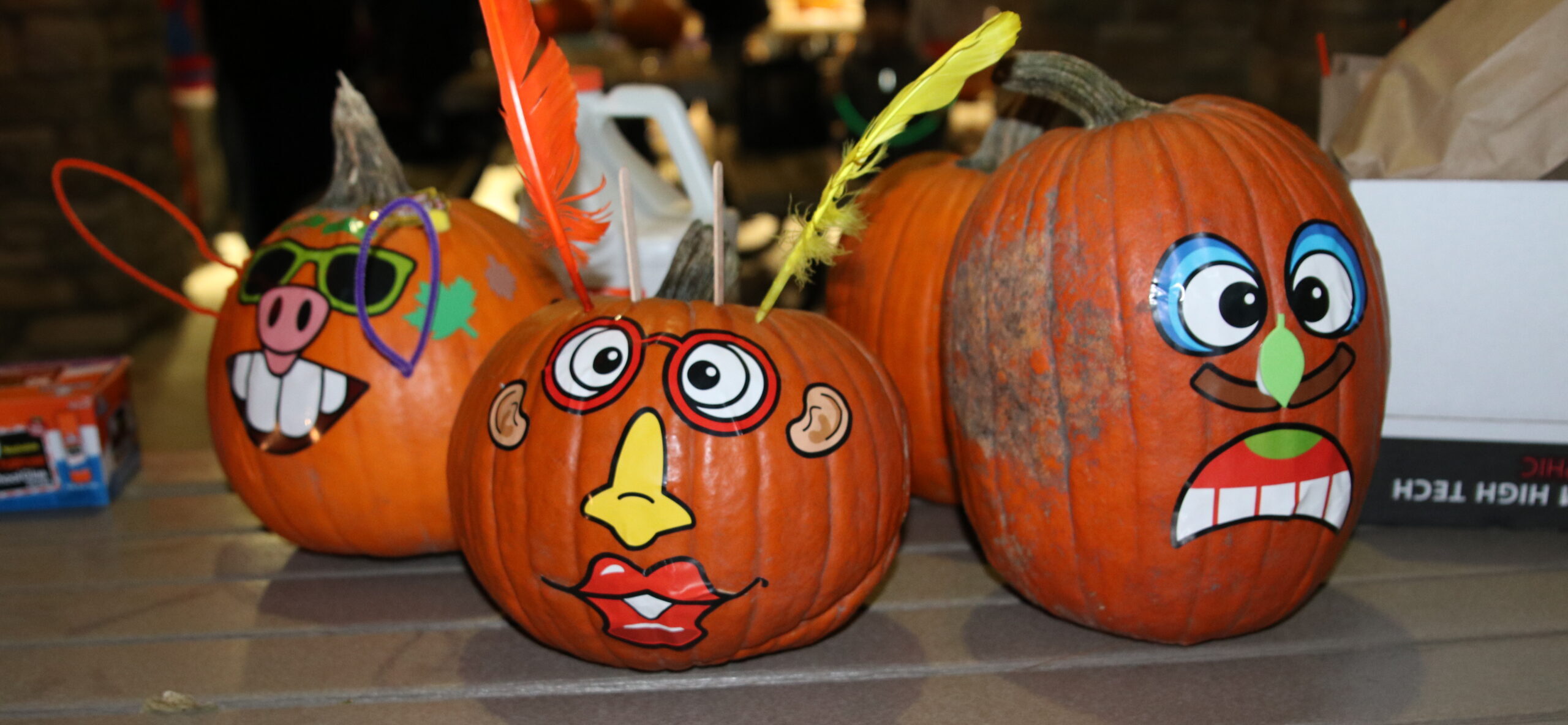 3 decorated pumpkins